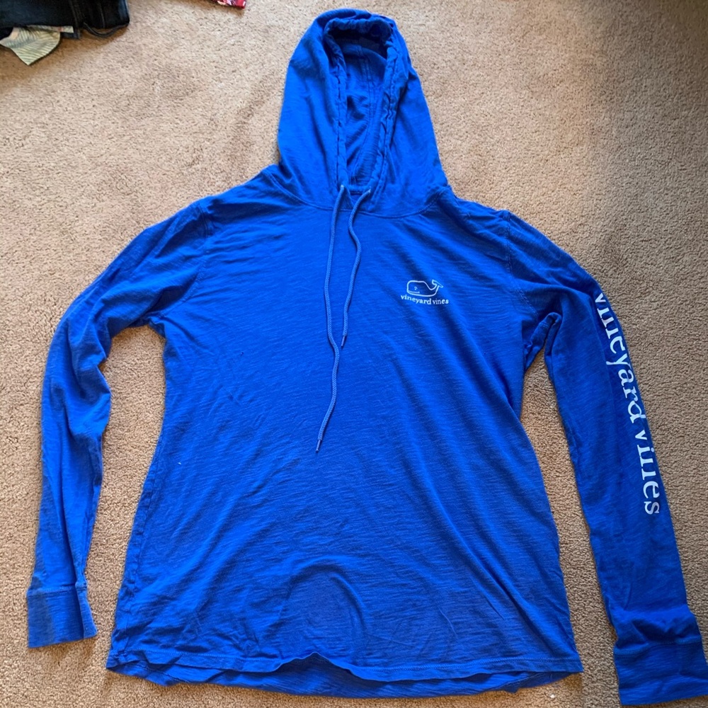 Blue hooded long sleeve shirt.